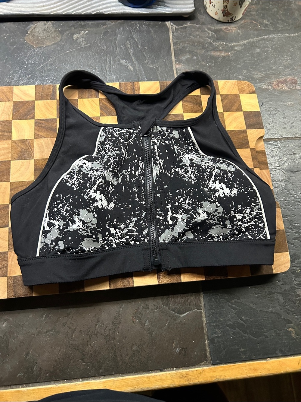 High-Impact Front-Zip Black Sports Bra with White Splatter Detail